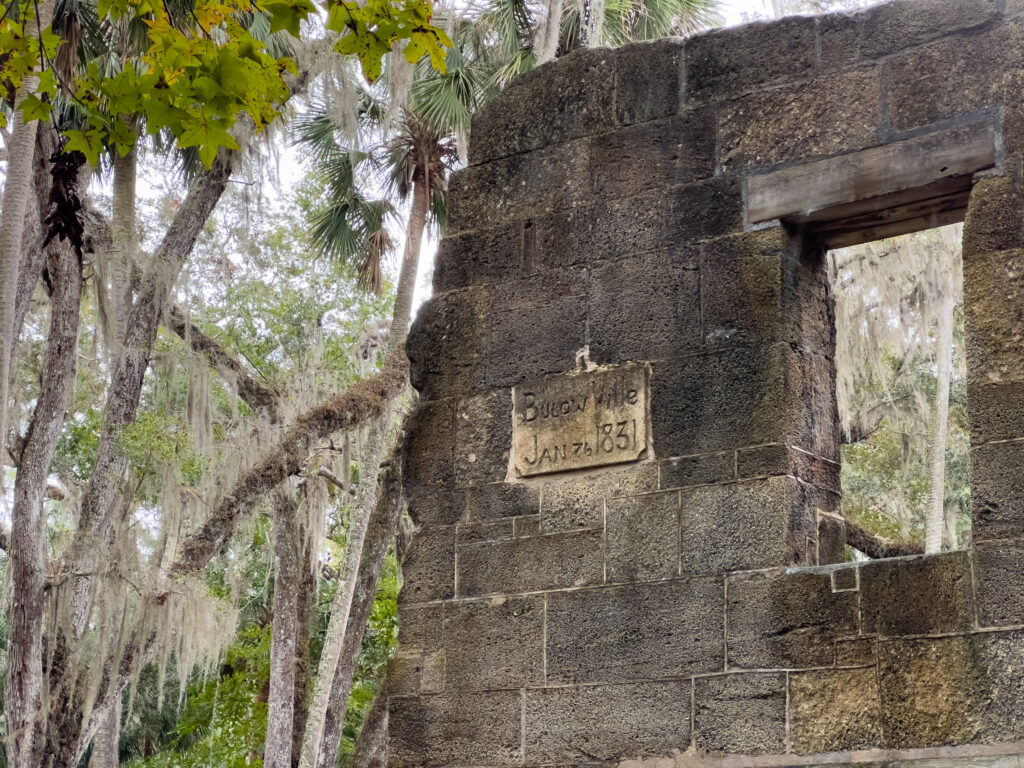 A hand-carved sign set into the wall of ruins readys "Bulowville Jan 26 1831" at Bulow Plantation Ruins State Park. 