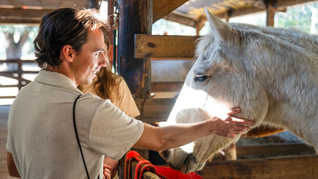 Ocala Fort McCoy Man Petting Horse
